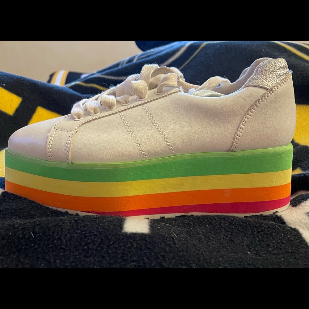 White and rainbow platform sneakers.